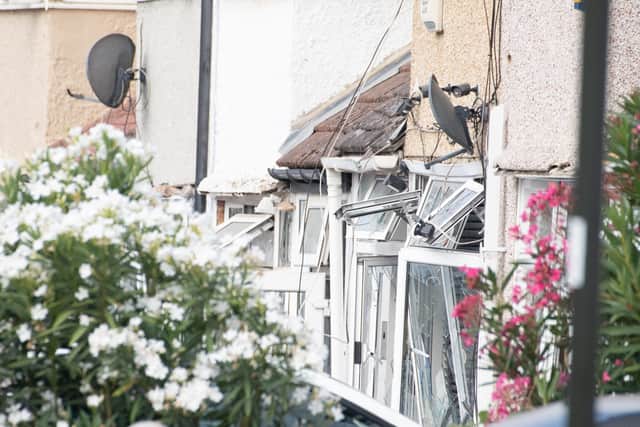 Damage to homes caused by suspected gas explosion that demolished a home yesterday killing a four-year-old-girl. Credit: SWNS