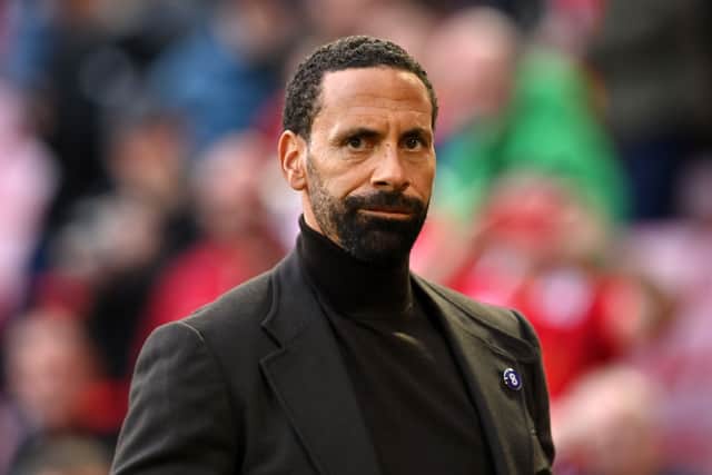  Rio Ferdinand is seen working for TV before the English Premier League football match . (Photo by PAUL ELLIS/AFP via Getty Images)