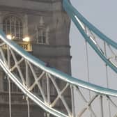The man on Tower Bridge which forced police to close it.