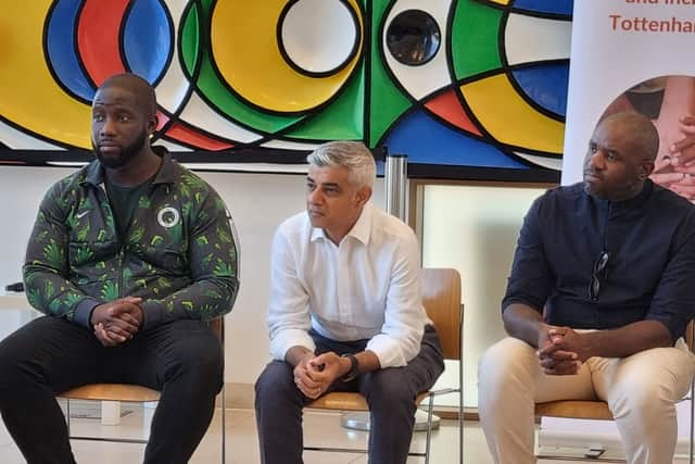 Mayor Sadiq Khan, centre, with Tottenham MP David Lammy, right, and youth worker Obi Onyido, left. Photo: LondonWorld