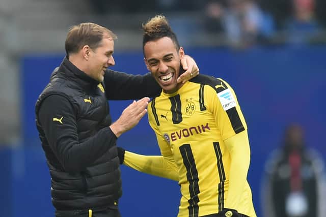 Pierre-Emerick Aubameyang from Dortmund celebrateS with coach Thomas Tuchel (L) his goal during the German first division  (Photo credit should read CARMEN JASPERSEN/AFP via Getty Images)
