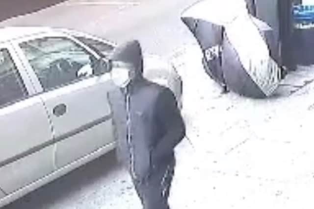 CCTV footage shows the suspect walking along Kirkdale, in Sydenham, just before the incident. Credit: Met Police