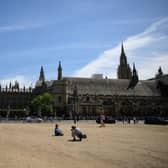 Parliament Square - usually grass covered - has been dust for most of the summer due to the hot weather and drought. Credit: Leon Neal/Getty Images
