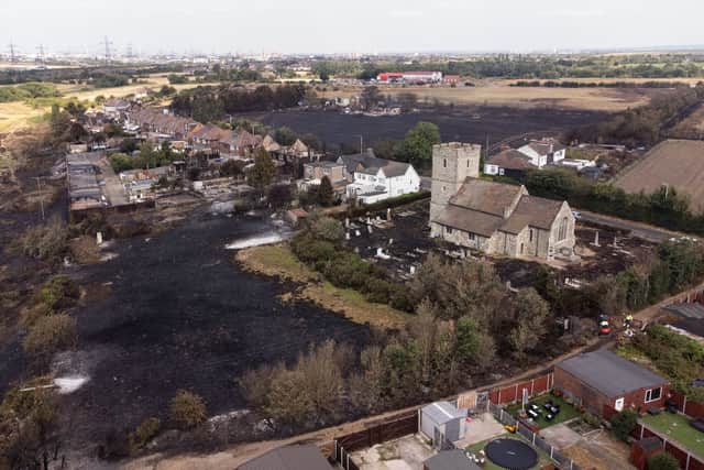 The blackened remains of Wennington village, Havering, after a huge grass fire on London’s hottest day in history. Credit: Leon Neal/Getty Images
