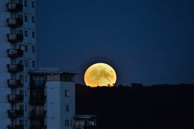  Andrew Christy took this snap of the supermoon rising over North Woolwich in Newham.
