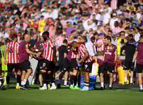 Players of Brentford FC take part in a water break during the Premier League match (Photo by Shaun Botterill/Getty Images)