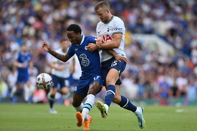 Sterling battles Eric Dier. Credit: GLYN KIRK/AFP via Getty Images