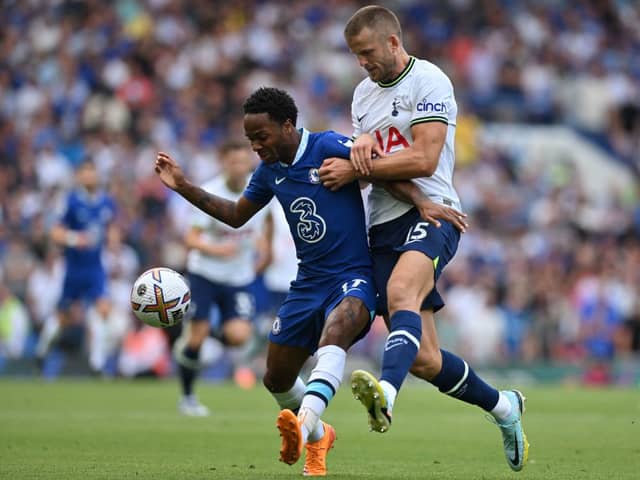 Sterling battles Eric Dier. Credit: GLYN KIRK/AFP via Getty Images
