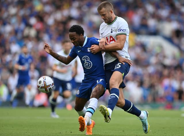 Sterling battles Eric Dier. Credit: GLYN KIRK/AFP via Getty Images