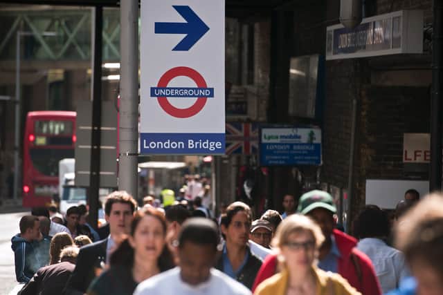 Commuters are pictured outside London Bridge train and underground station. Photo: Getty