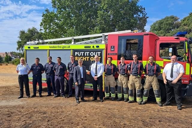 Sadiq Khan at Leyton flats with members of the London Fire Brigade. Credit: LFB