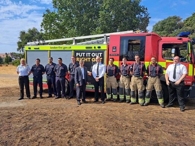 Sadiq Khan at Leyton flats with members of the London Fire Brigade. Credit: LFB