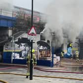 London Bridge station has ground to a halt after a huge fire broke out underneath the railway arches. Photo: LFB
