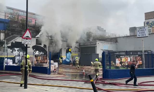 London Bridge station has ground to a halt after a huge fire broke out underneath the railway arches. Photo: LFB