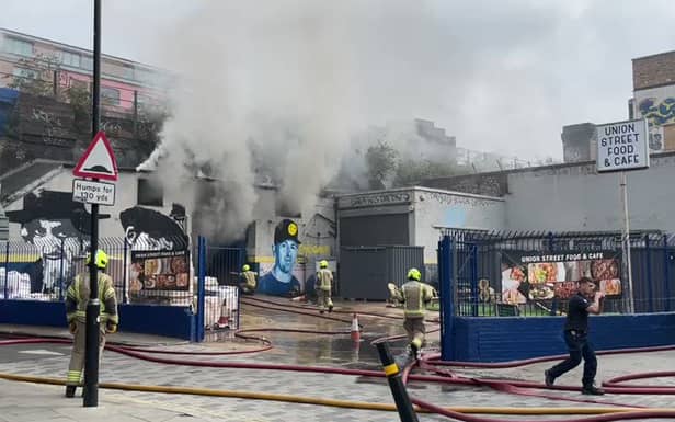 London Bridge station has ground to a halt after a huge fire broke out underneath the railway arches. Photo: LFB