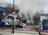London Bridge station has ground to a halt after a huge fire broke out underneath the railway arches. Photo: LFB