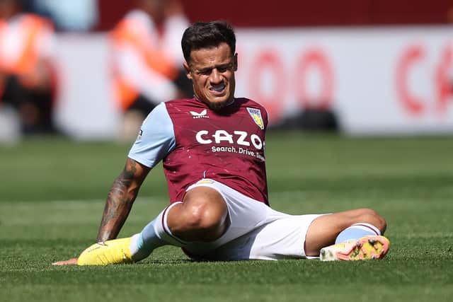  Philippe Coutinho of Aston Villa reacts before being substituted with an injury during the Premier League match  (Photo by Marc Atkins/Getty Images)