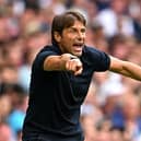 Antonio Conte, Manager of Tottenham Hotspur, gives instructions to his players (Photo by Clive Mason/Getty Images)