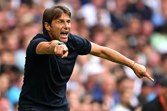 Antonio Conte, Manager of Tottenham Hotspur, gives instructions to his players (Photo by Clive Mason/Getty Images)