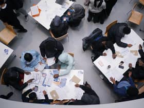 Pupils after receiving their GCSE results at Oasis Academy Hadley in Ponders End, London 