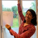 Sasha Chaudri with her GCSE results. Credit: SWNS