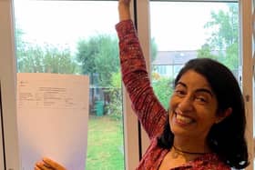 Sasha Chaudri with her GCSE results. Credit: SWNS