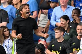 Tottenham Hotspur’s Italian head coach Antonio Conte celebrates on the final whistle in the English Premier League football match  (Photo by GLYN KIRK/AFP via Getty Images)