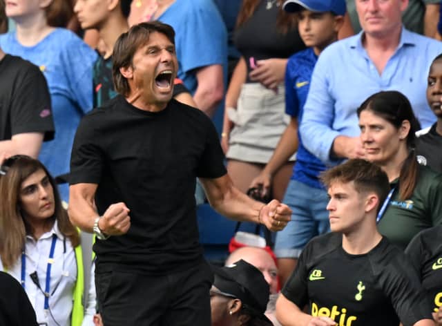 Tottenham Hotspur’s Italian head coach Antonio Conte celebrates on the final whistle in the English Premier League football match  (Photo by GLYN KIRK/AFP via Getty Images)