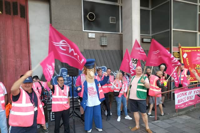 Postal workers outside the Royal Mail Whitechapel Delivery Office