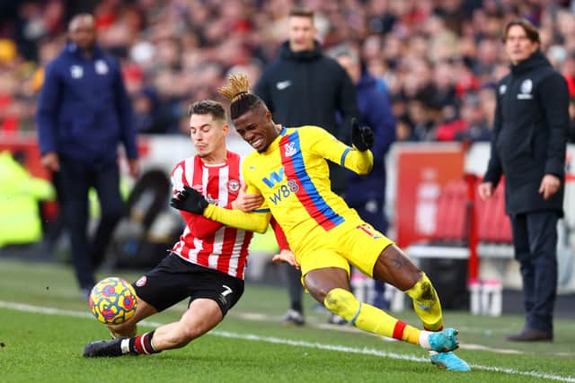 Sergi Canos of Brentford and Wilfried Zaha of Crystal Palace are both doubts for the Premier League clash between the two sides