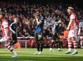 Bruno Fernandes of Manchester United reacts after missing a penalty during the Premier League match between Arsenal and Manchester United