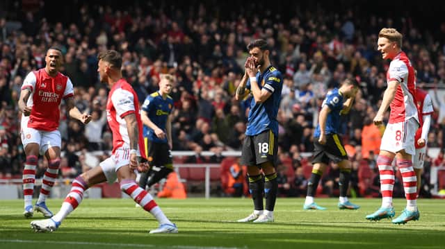 Bruno Fernandes of Manchester United reacts after missing a penalty during the Premier League match between Arsenal and Manchester United
