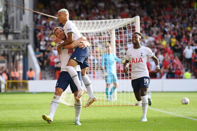 Harry Kane of Tottenham Hotspur celebrates with Richarlison after scoring their team's second goal  (Photo by Michael Regan/Getty Images)