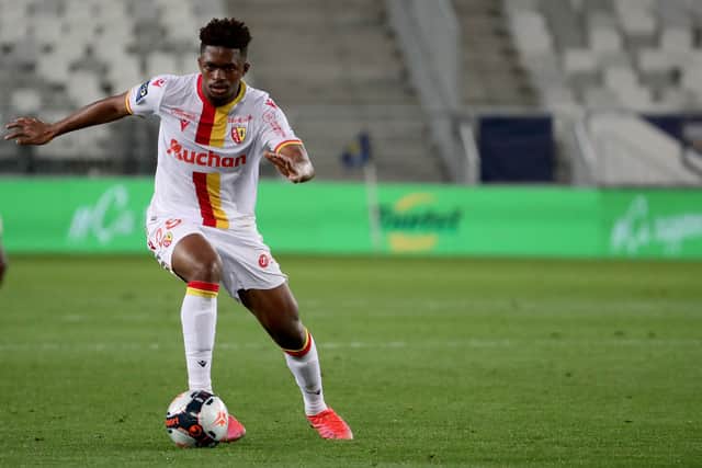 Cheick Doucoure runs with the ball during the French L1 football match between FC Girondins de Bordeaux and RC Lens (Photo by ROMAIN PERROCHEAU/AFP via Getty Images)