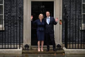 New UK prime minister Liz Truss poses with her husband Hugh O’Leary at Downing Street. Photo: Getty