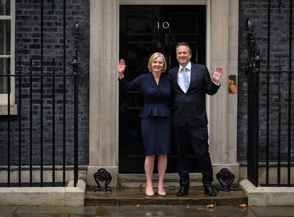 New UK prime minister Liz Truss poses with her husband Hugh O’Leary at Downing Street. Photo: Getty