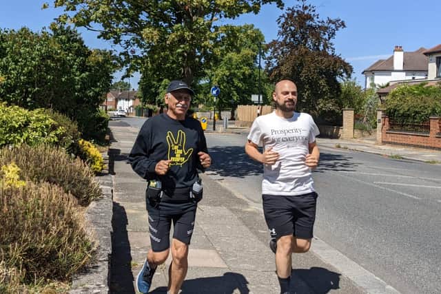 Anoosheh Ashoori (left) training for the London Marathon with son Aryan (right)