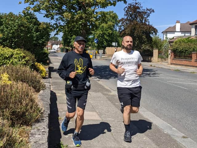 Anoosheh Ashoori (left) training for the London Marathon with son Aryan (right)