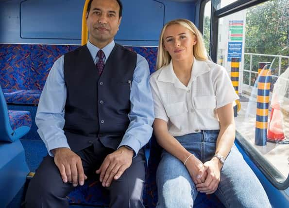 Chloe Kelly with bus driver Ashwani Kumar. Photo: TfL