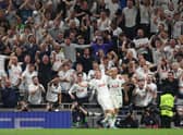 Richarlison of Tottenham Hotspur celebrates with teammate Dejan Kulusevski  (Photo by Richard Heathcote/Getty Images)