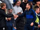 Chelsea’s English head coach Frank Lampard (R) shakes hands with Brighton’s English manager Graham Potter (L). (Photo credit should read GLYN KIRK/AFP via Getty Images)