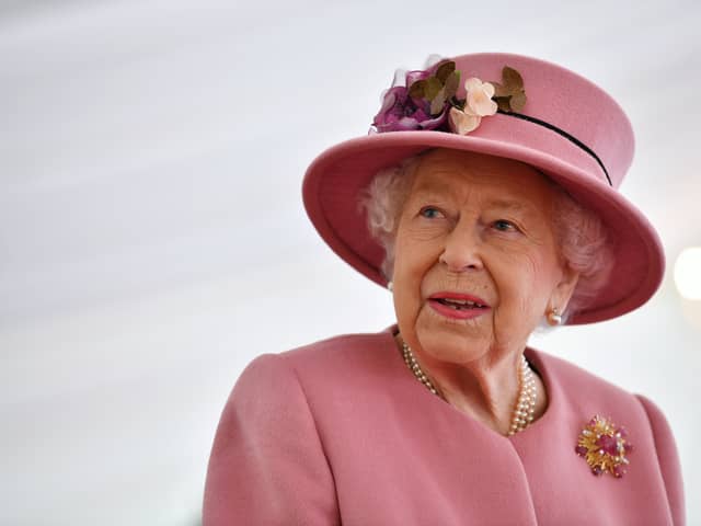 Queen Elizabeth II speaks with staff during a visit to the Defence Science and Technology Laboratory (Dstl) at Porton Down science park on October 15, 2020 near Salisbury, England. (Photo: Ben Stansall - WPA Pool/Getty Images)