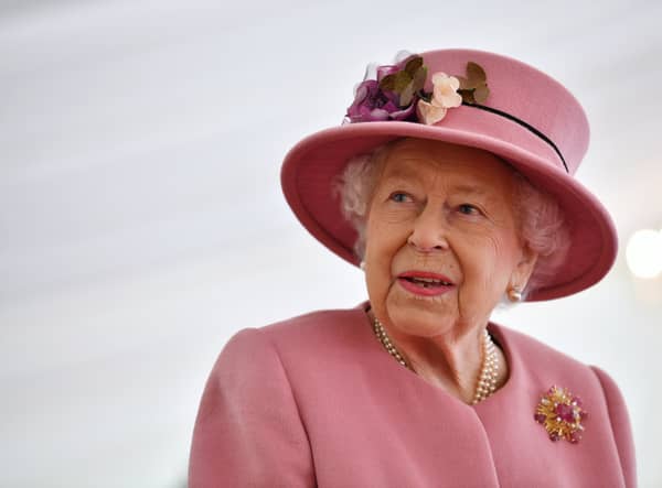 Queen Elizabeth II speaks with staff during a visit to the Defence Science and Technology Laboratory (Dstl) at Porton Down science park on October 15, 2020 near Salisbury, England. (Photo: Ben Stansall - WPA Pool/Getty Images)