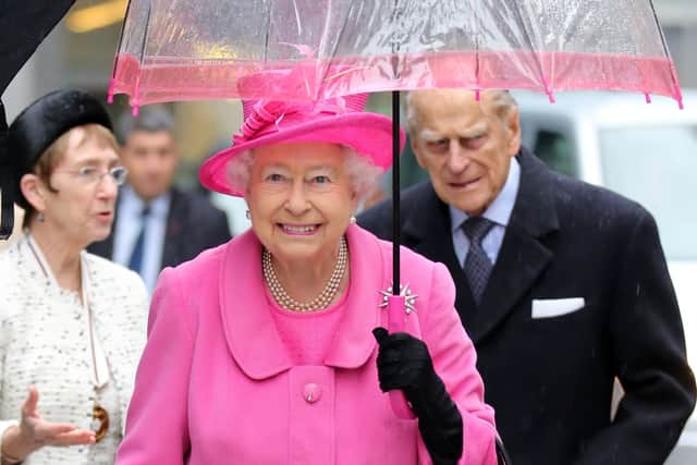 Queen Elizabeth II and Prince Philip visiting the Metroline Tramline Extension on 19 November 2015 in London (Getty Images)
