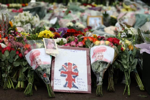 A handmade message to the late Queen Elizabeth II placed with the floral tributes at Windsor Castle