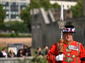 A Yeomen Warders stands guard for the Death Gun Salute fired at the Tower of London, taking place to mark the death of Queen Elizabeth II.