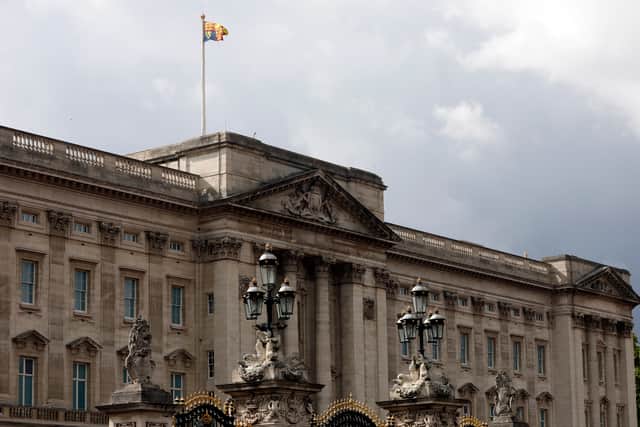 The Royal Standard flag flies over Buckingham Palace. Photo: Getty