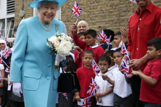 Queen Elizabeth visits Mayflower Primary School in Poplar