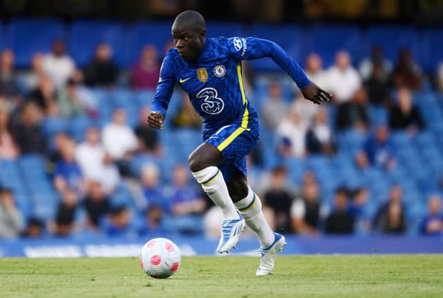 Ngolo Kante of Chelsea runs with the ball during the Premier League match between Chelsea and Leicester (Photo by Mike Hewitt/Getty Images)