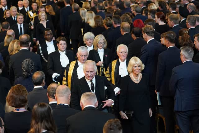 King Charles III and the Queen Consort depart Westminster Hall. Photo: Getty